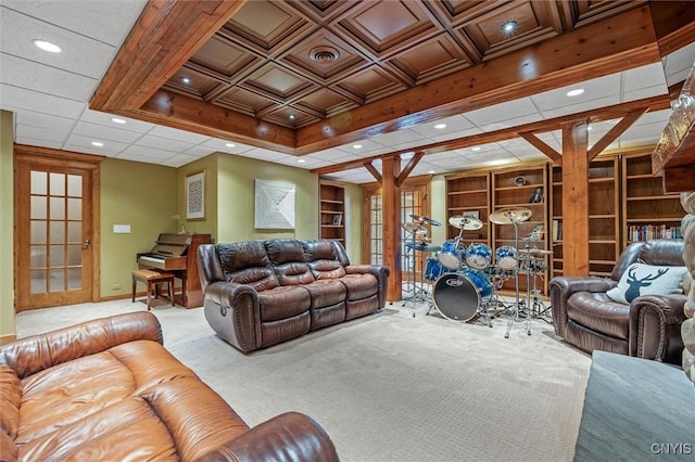 living area featuring carpet floors, recessed lighting, baseboards, coffered ceiling, and built in shelves