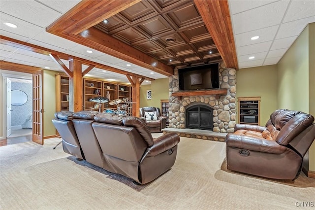 carpeted living room featuring a fireplace, recessed lighting, and baseboards