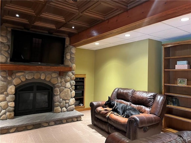 carpeted living room featuring recessed lighting, a fireplace, and beam ceiling