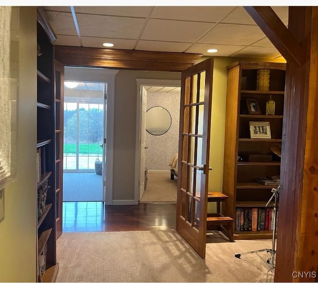 hallway featuring carpet flooring, recessed lighting, and baseboards