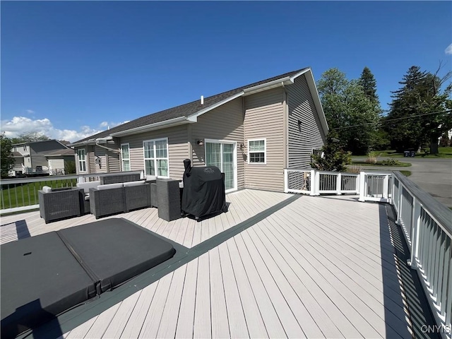 deck featuring outdoor lounge area