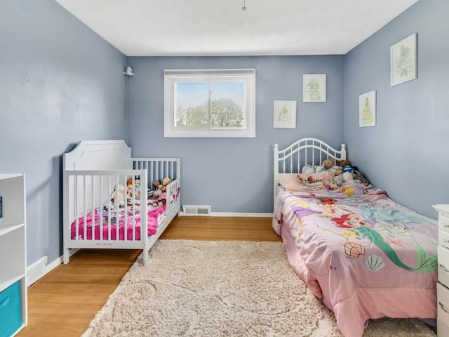 163 Lyncourt Park, Greece, NY 14612 - bedroom with wood finished floors and baseboards