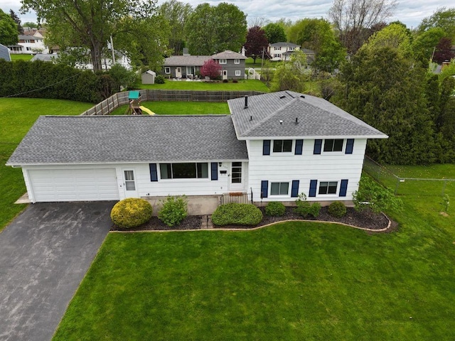 163 Lyncourt Park, Greece, NY 14612 - tri-level home with a shingled roof, a garage, and asphalt driveway