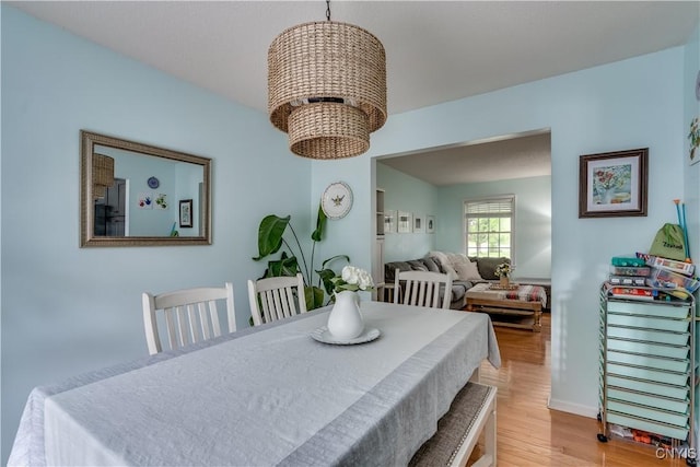 467 Barben Ave, Watertown-City, NY 13601 - dining area featuring light wood-style flooring and baseboards