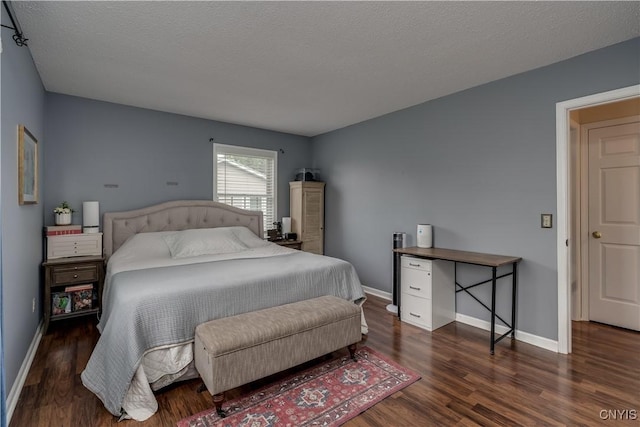 467 Barben Ave, Watertown-City, NY 13601 - bedroom featuring wood finished floors, baseboards, and a textured ceiling