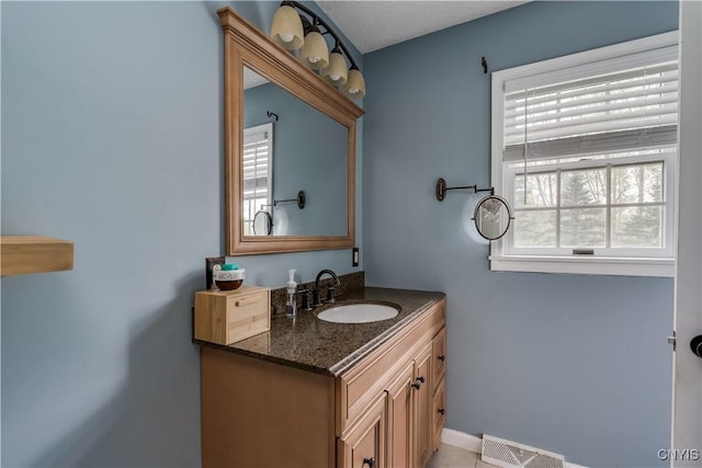 467 Barben Ave, Watertown-City, NY 13601 - bathroom featuring vanity and baseboards