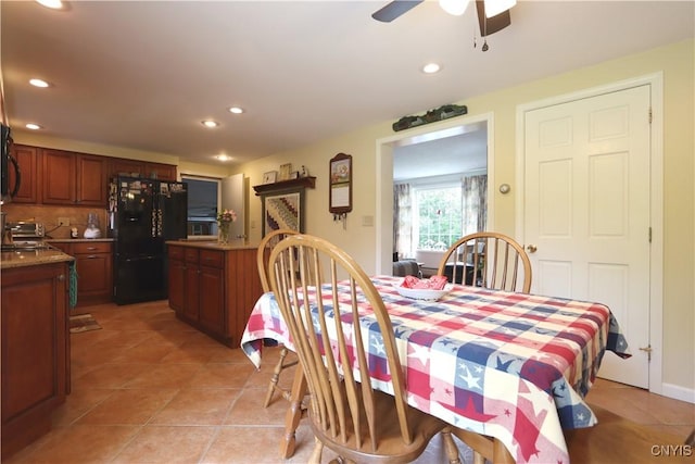 dining space with ceiling fan, light tile patterned floors, and recessed lighting