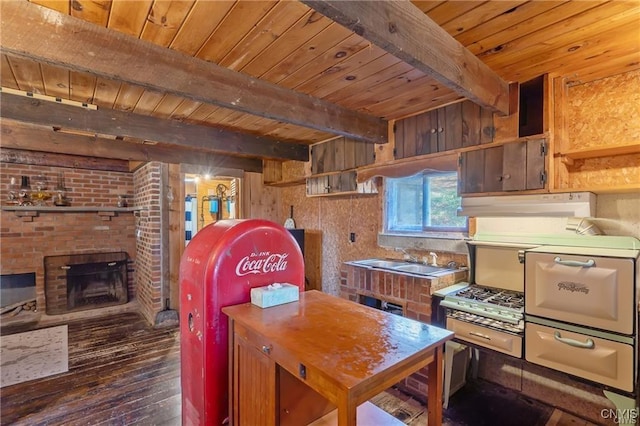 419 Glenwood Ln, Niles, NY 13021 - kitchen with wood ceiling, dark wood-style flooring, beam ceiling, a fireplace, and a sink