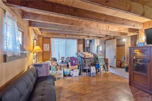 419 Glenwood Ln, Niles, NY 13021 - living area with beamed ceiling, wood finished floors, wood ceiling, and wood walls