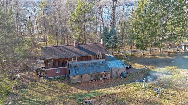 419 Glenwood Ln, Niles, NY 13021 - rear view of house featuring a chimney