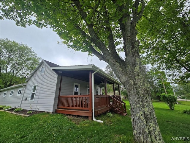 2282 Rte 305, Clarksville, NY 14727 - view of property exterior featuring a lawn and a porch