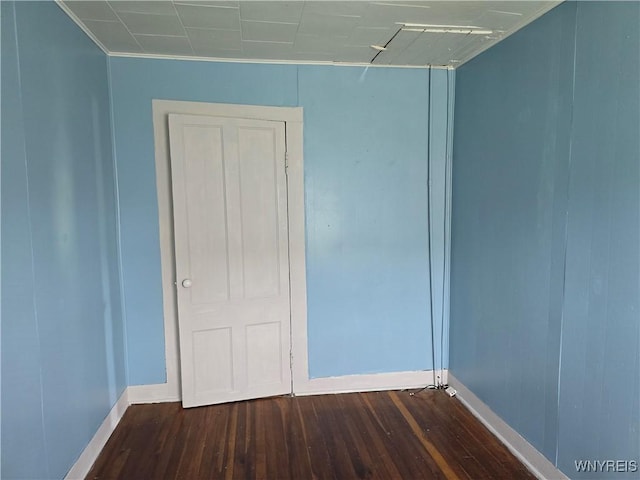 2282 Rte 305, Clarksville, NY 14727 - unfurnished bedroom with baseboards, wood finished floors, and crown molding