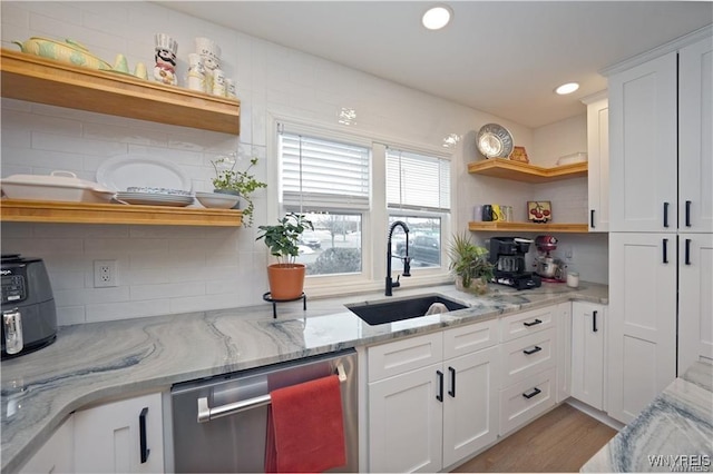 3912 Seneca St Unit 1, West Seneca, NY 14224 - kitchen featuring open shelves, dishwasher, a sink, white cabinetry, and backsplash