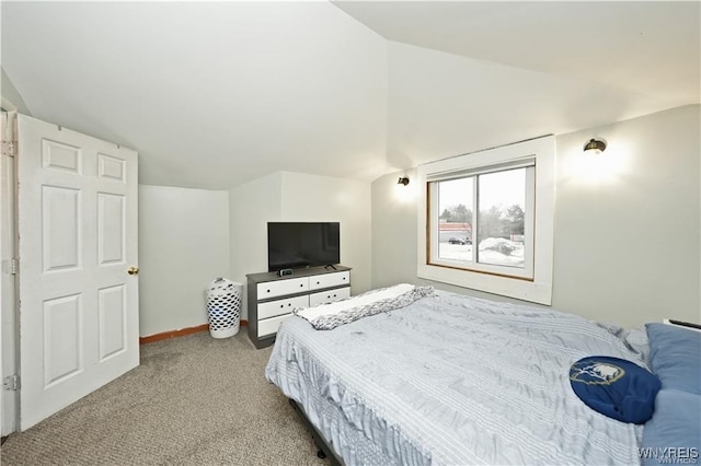 3912 Seneca St Unit 1, West Seneca, NY 14224 - bedroom with vaulted ceiling, carpet flooring, and baseboards