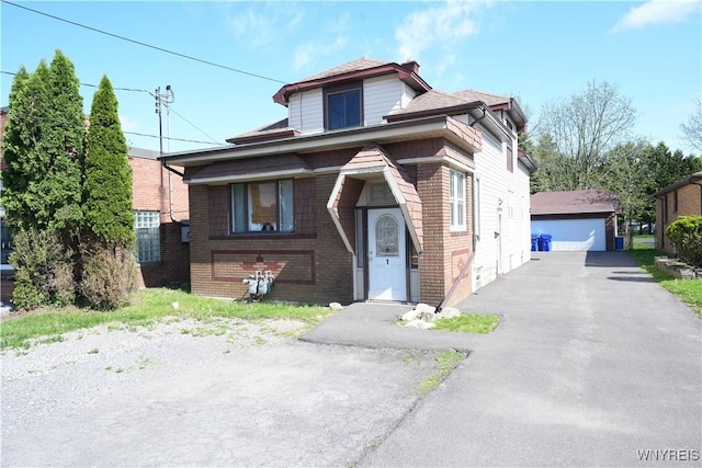 3912 Seneca St Unit 1, West Seneca, NY 14224 - view of front of house featuring a detached garage and brick siding