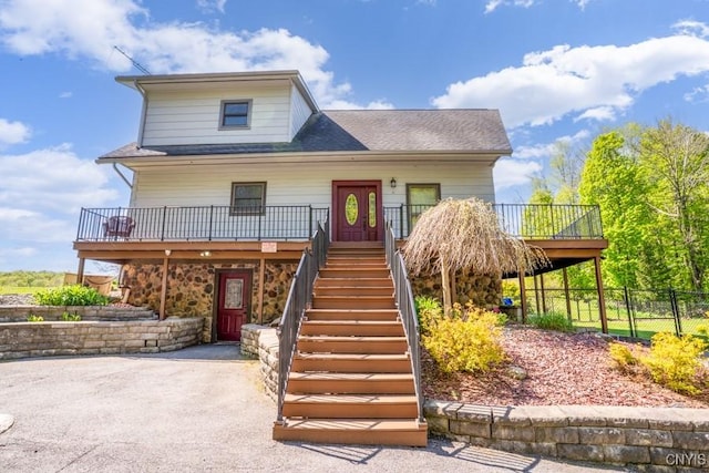 240 Mucky Run Rd, Frankfort, NY 13340 - view of front of house with stairs, fence, and stone siding