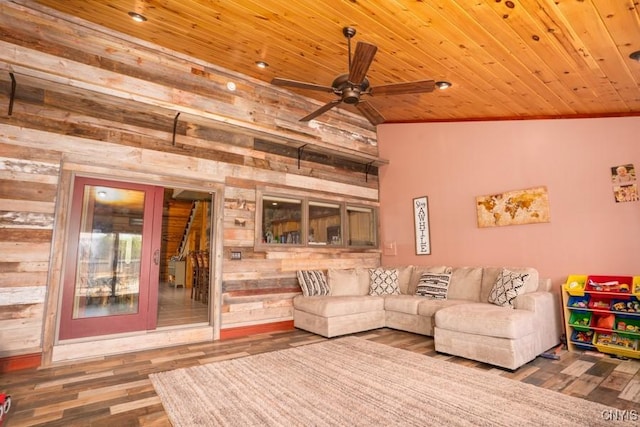 240 Mucky Run Rd, Frankfort, NY 13340 - living area featuring wood walls, wooden ceiling, a ceiling fan, wood finished floors, and ornamental molding