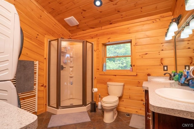 240 Mucky Run Rd, Frankfort, NY 13340 - full bathroom featuring stacked washer and clothes dryer, tile patterned flooring, a stall shower, double vanity, and wooden walls