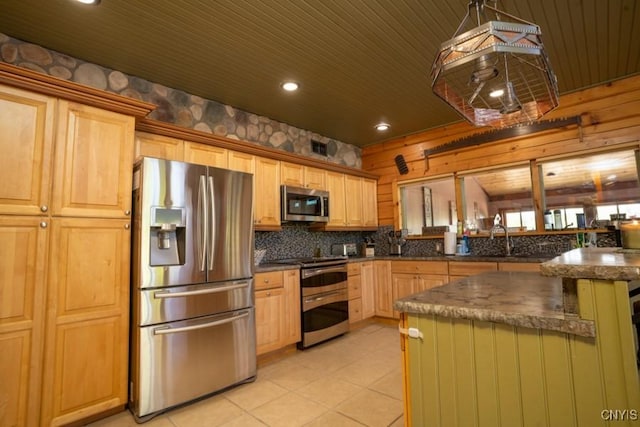 240 Mucky Run Rd, Frankfort, NY 13340 - kitchen with stainless steel appliances, light tile patterned floors, decorative backsplash, recessed lighting, and light brown cabinetry