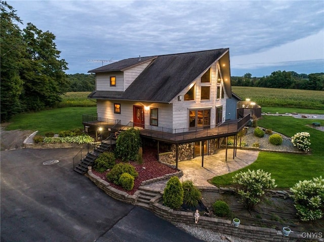 240 Mucky Run Rd, Frankfort, NY 13340 - view of front of property with a deck, a front lawn, stairs, and a patio
