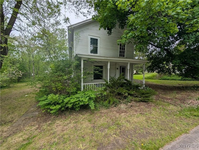 11 N Main St, Cohocton, NY 14826 - view of front facade featuring covered porch