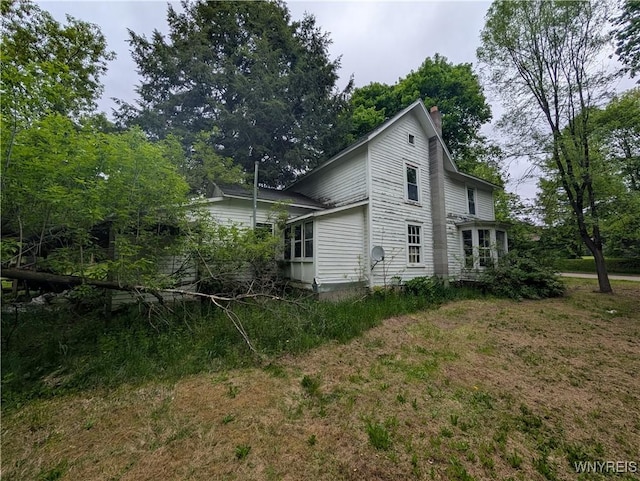 11 N Main St, Cohocton, NY 14826 - view of property exterior featuring a chimney
