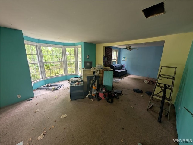 11 N Main St, Cohocton, NY 14826 - carpeted living room featuring a ceiling fan