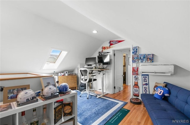 home office featuring a skylight, lofted ceiling, wood finished floors, and recessed lighting