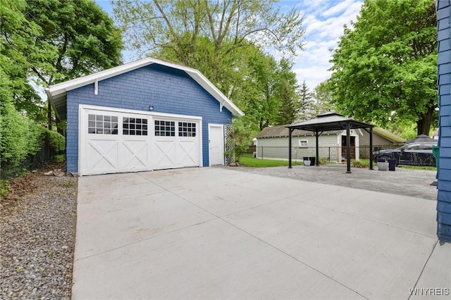 detached garage with fence