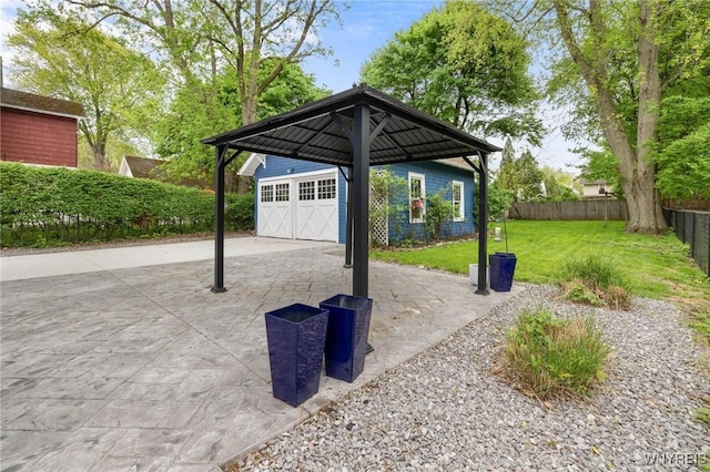 view of patio / terrace with a garage