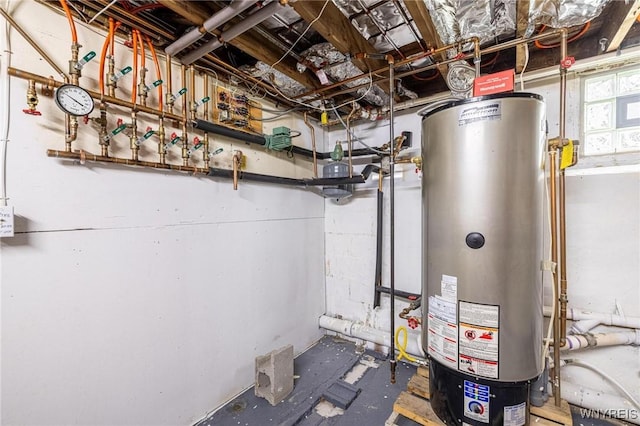 utility room featuring gas water heater