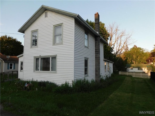 11141 W Park St, Pavilion, NY 14525 - rear view of property with a chimney