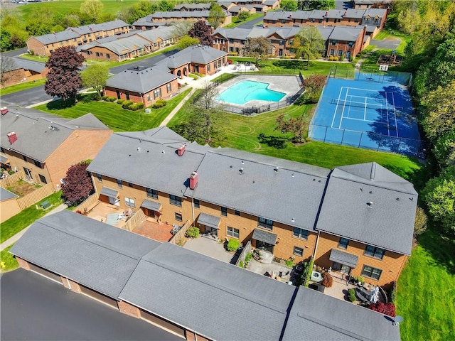 aerial view of residential area featuring a pool