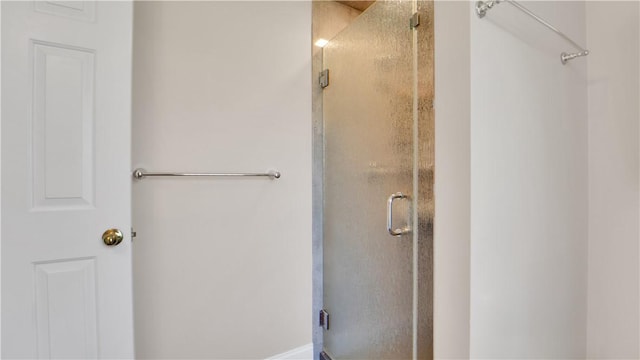 full bathroom with a stall shower
