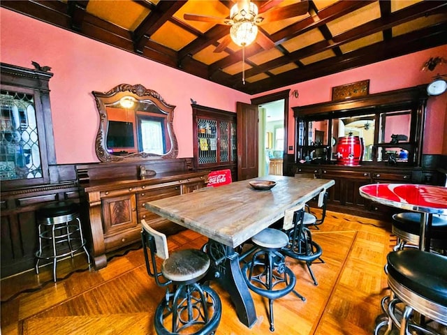 440 Park Ave, Barton, NY 14892 - dining room with coffered ceiling, a ceiling fan, beamed ceiling, and bar area