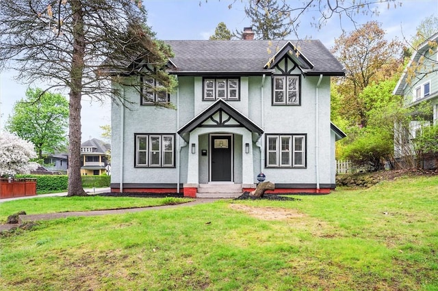 202 Crosman Ter, Rochester, NY 14620 - tudor house featuring a chimney, stucco siding, and a shingled roof