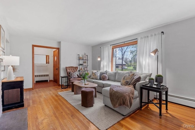 10 S Ten Eyck Ave, Cazenovia, NY 13035 - living room featuring radiator and wood finished floors