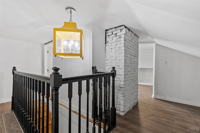 10 S Ten Eyck Ave, Cazenovia, NY 13035 - hallway with an upstairs landing, wood finished floors, vaulted ceiling, and baseboards