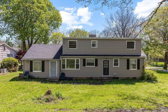 10 S Ten Eyck Ave, Cazenovia, NY 13035 - view of front of property with entry steps, a front yard, and a chimney