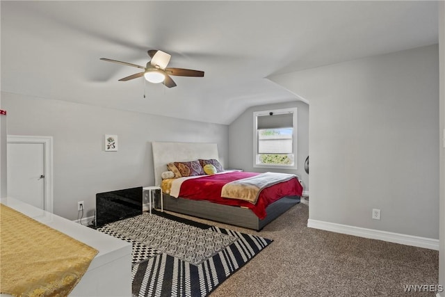 carpeted bedroom featuring lofted ceiling, ceiling fan, and baseboards