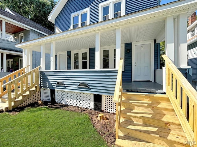 214 Herriman St Unit 216, Syracuse, NY 13204 - property entrance featuring covered porch and a lawn