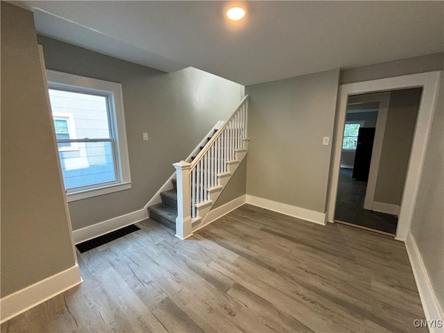 214 Herriman St Unit 216, Syracuse, NY 13204 - stairs featuring wood finished floors, baseboards, and recessed lighting