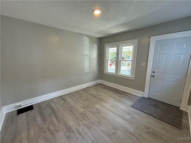214 Herriman St Unit 216, Syracuse, NY 13204 - foyer with baseboards and wood finished floors