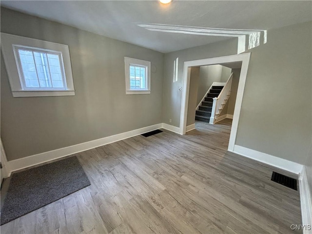 214 Herriman St Unit 216, Syracuse, NY 13204 - unfurnished room with baseboards and wood finished floors