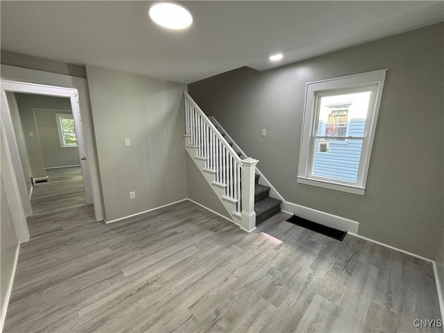 214 Herriman St Unit 216, Syracuse, NY 13204 - stairs with wood finished floors and baseboards