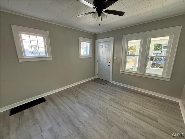 214 Herriman St Unit 216, Syracuse, NY 13204 - foyer featuring ornamental molding, ceiling fan, wood finished floors, and baseboards