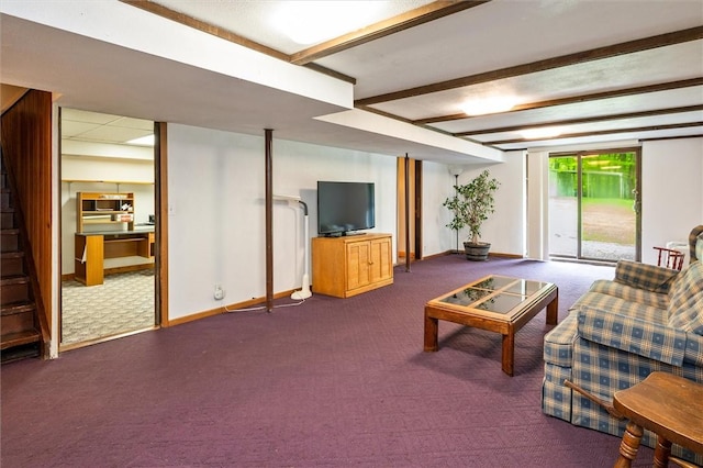 living area featuring carpet, beamed ceiling, and baseboards