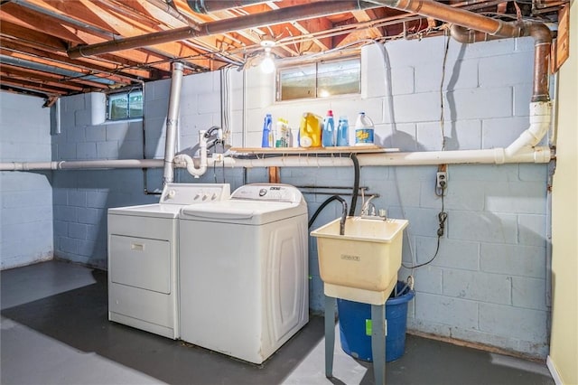 laundry room featuring washing machine and clothes dryer