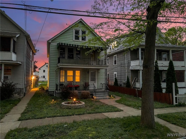 2254 Grand Ave, Niagara Falls, NY 14301 - view of front of home featuring a balcony, an outdoor fire pit, and a porch