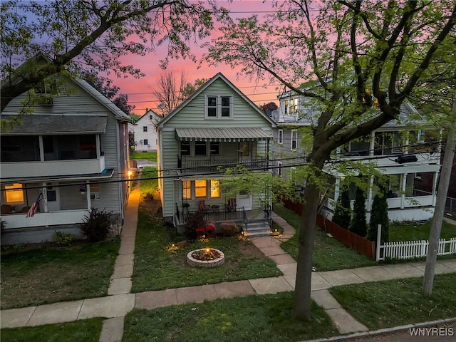 2254 Grand Ave, Niagara Falls, NY 14301 - view of front of property featuring an outdoor fire pit and a porch